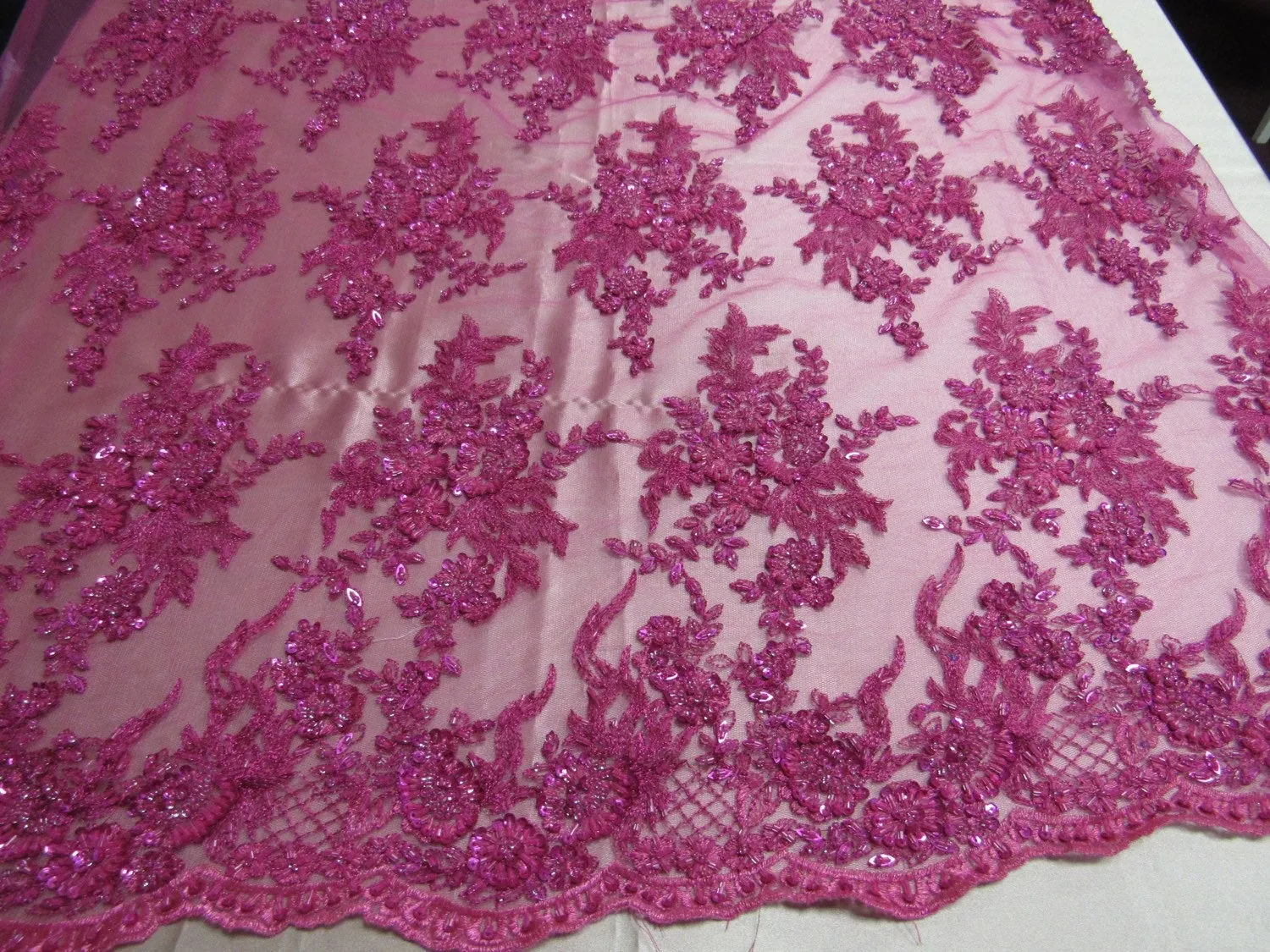 Gorgeous fuchsia/magenta French floral  design embroider and beaded on a mesh lace. Wedding/Bridal/Prom/Nightgown fabric-sold by yard.