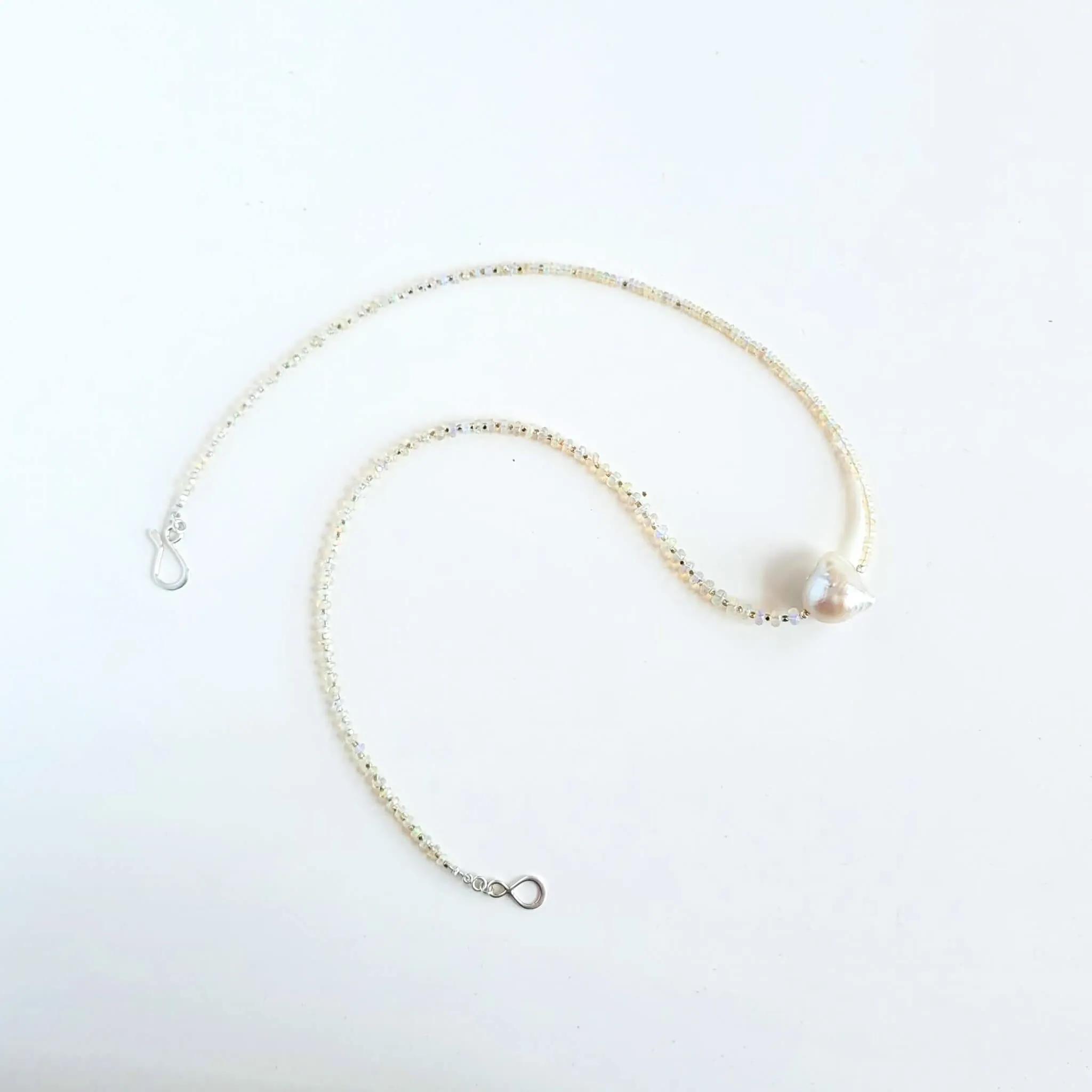 Iridescent Opal and Silver Necklace with a Baroque Pearl Center