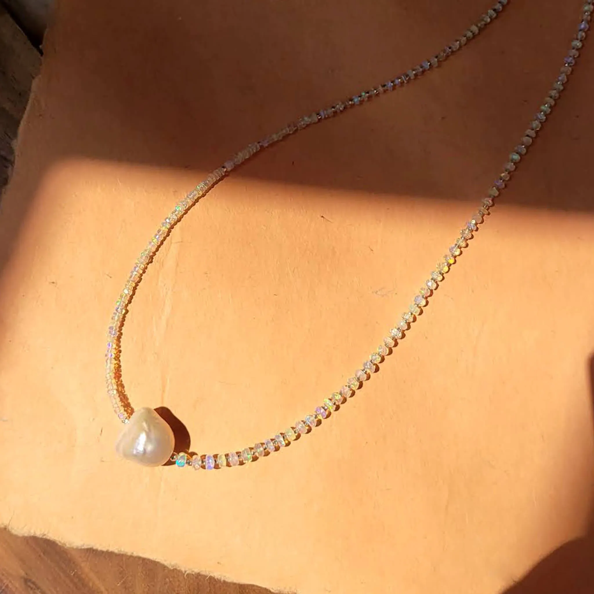 Iridescent Opal and Silver Necklace with a Baroque Pearl Center